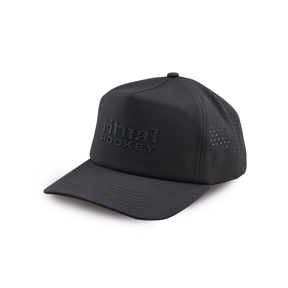 Black cap with 'ritual hockey' branding on a white background